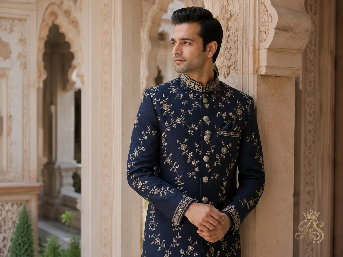 Luxurious navy sherwani with refined embroidery and rich silk texture